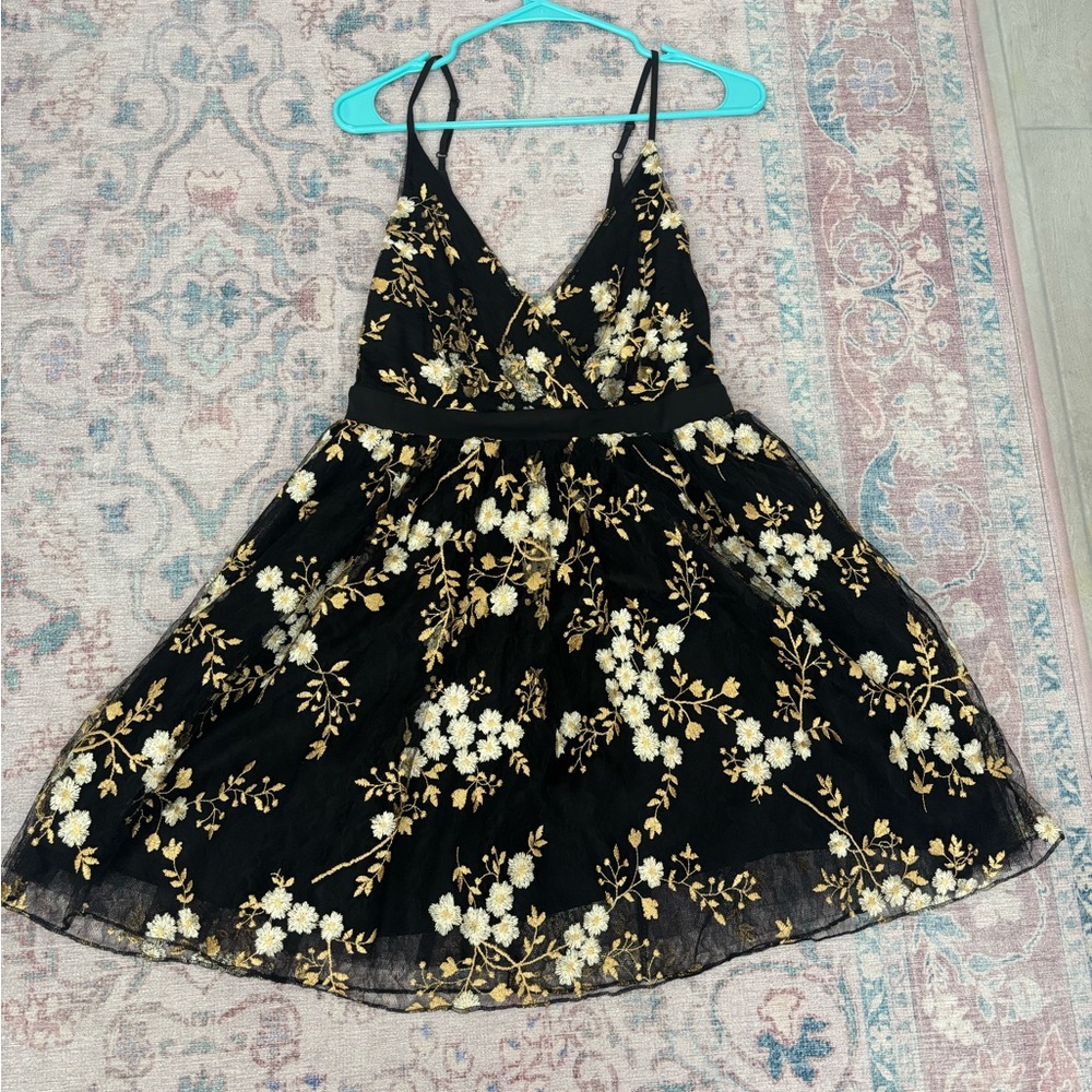 Express Black Dress with Gold Accents